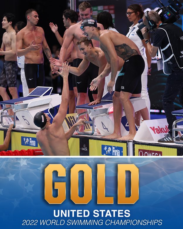 Carson Foster celebrating Gold Medal winning relay with teammates at World Championships.